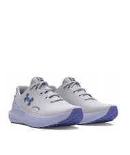 UNDER ARMOUR CHARGED SURGE 4 Baskets - Chaussures Femme