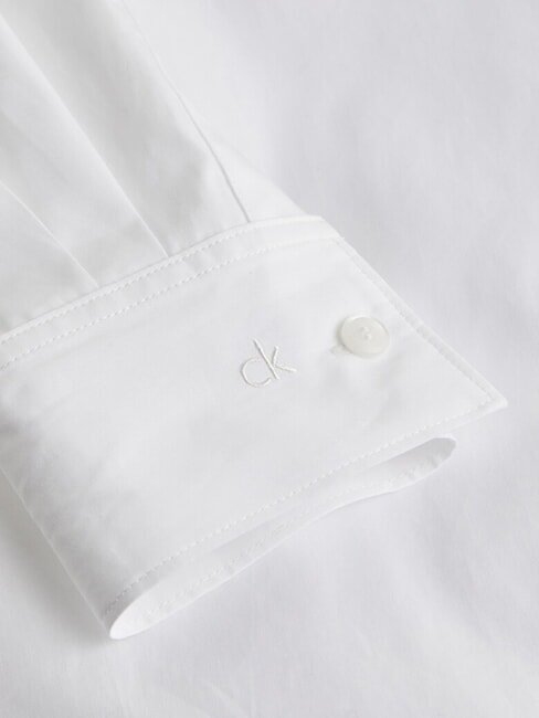 CK Chemise &agrave; manches longues coupe d&eacute;contract&eacute;e blanc brillant - Chemises
