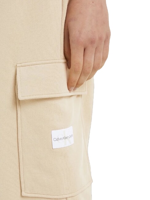 CK JEANS Pantalon de jogging avec grandes poches kaki pâle - Costumes de sport pour femmes