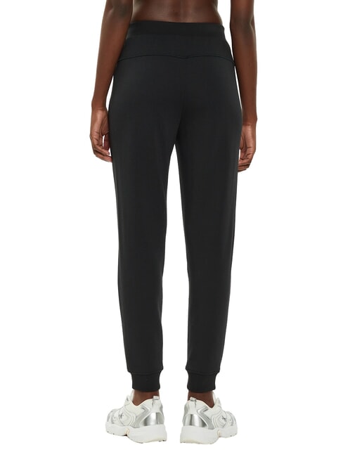 CK PERFORMANCE Pantalon de surv&ecirc;tement &eacute;lastique &agrave; la cheville beaut&eacute; noire - Costumes de sport pour femmes