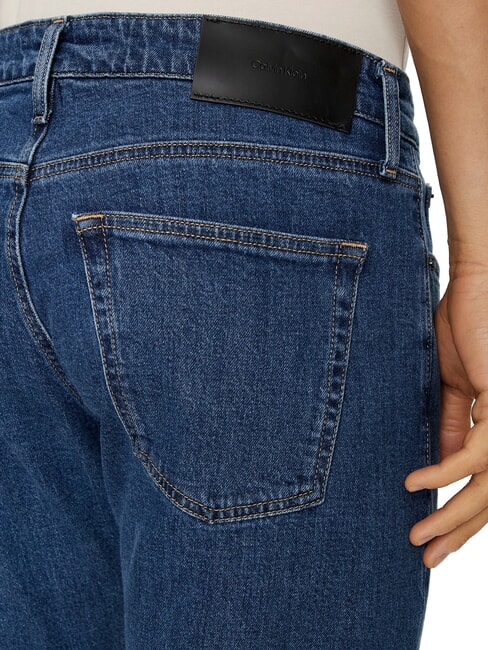 CK Jean slim &agrave; taille r&eacute;guli&egrave;re denim moyen - Jeans