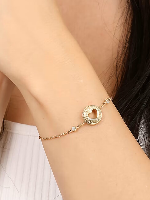 ROLLING HEARTS Bracelet avec c&oelig;ur or jaune - Bracelets