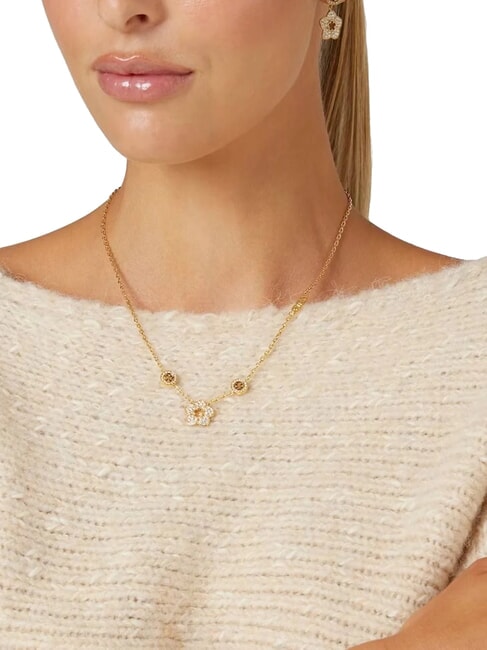 SHINING WINTER Collier orn&eacute; de fleurs et de cristaux or jaune - Colliers