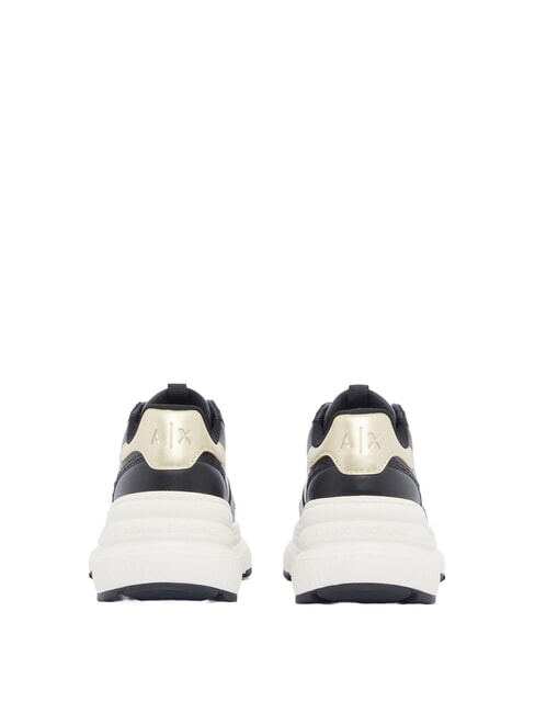 NIKY Baskets noir et or p&acirc;le - Chaussures Femme