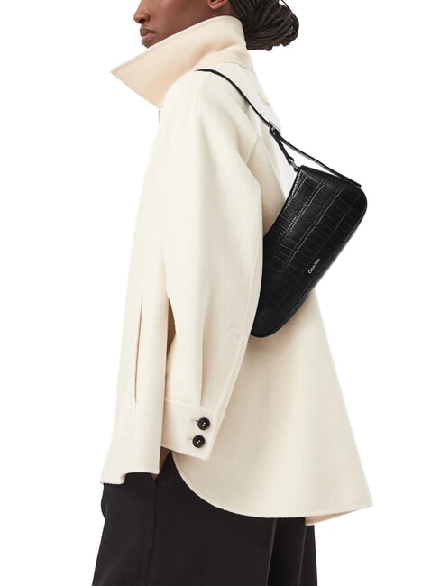 CK CROC sac bandouli&egrave;re sur noir - Sacs pour Femme